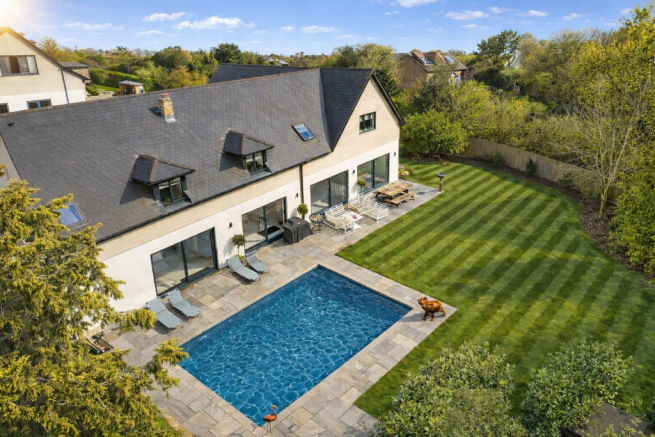 Modern backyard with pool and patio.png