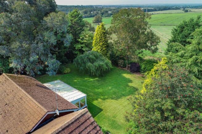 Aerial photo garden and open farmland beyond .jpg