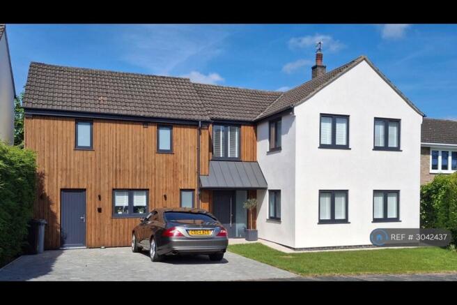Front Entrance And 2 Car Driveway
