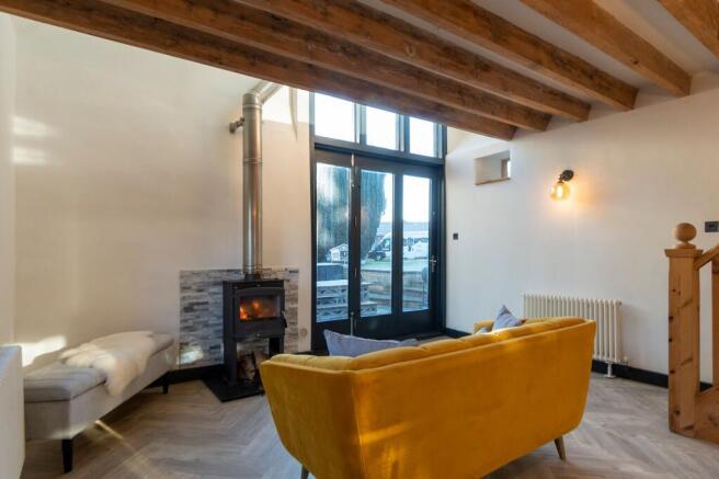 Annexe lounge with mezzanine to sleeping and shower room