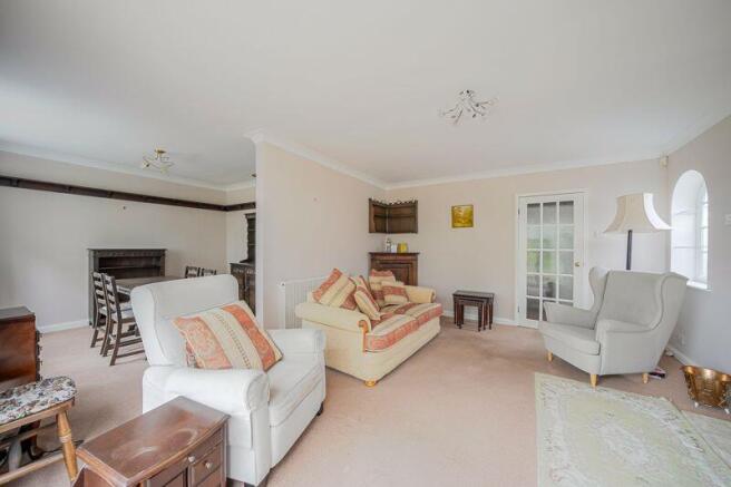 Open plan sitting room and dining room