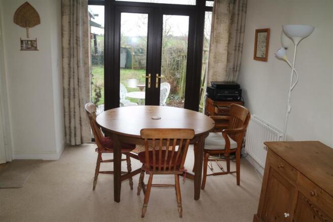 LOUNGE WITH SEPARATE BUT ADJOINING DINING ROOM