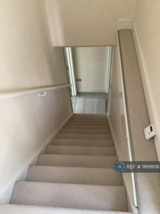 Carpeted Stairs Leading To First Floor