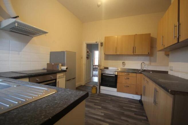 Bright kitchen with ample cupboard storage....