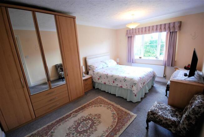 MASTER BEDROOM: