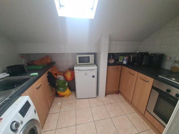 A well-organized kitchen with ample storage, fe...