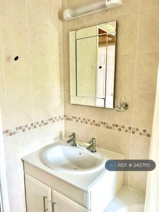 Washbasin Has Shaver Point Above Mirror