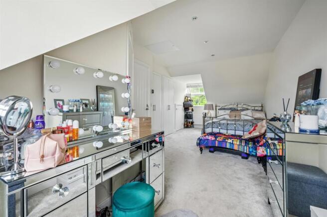 Bedroom Three - dressing area towards bed.jpg