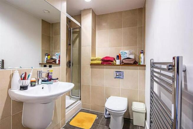 A modern and well-maintained bathroom featuring...