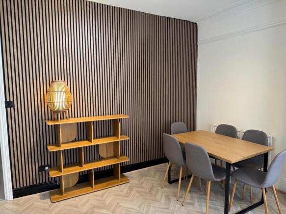 Stylish living area with dining table...