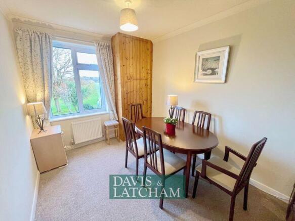 Bedroom Three currently serving as a ...