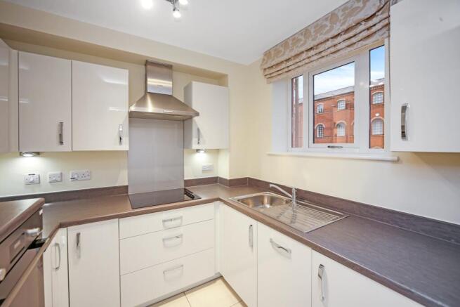 a kitchen with a large window