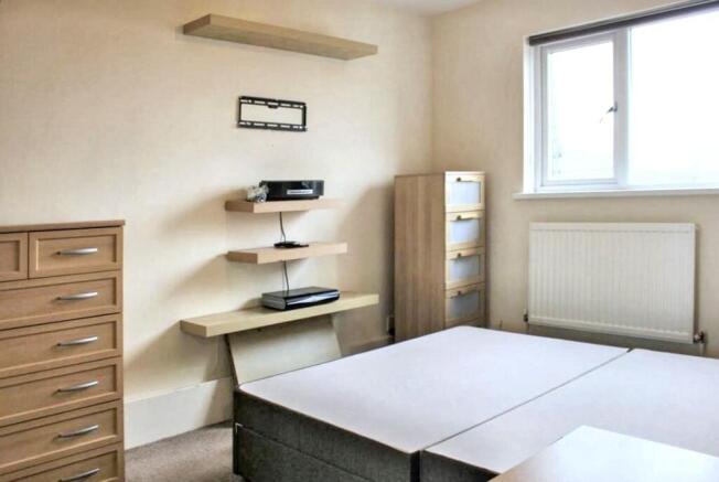 Bright bedroom with ample storage space...