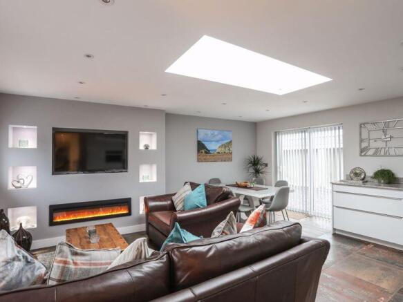 open plan lounge dining room and kitchen