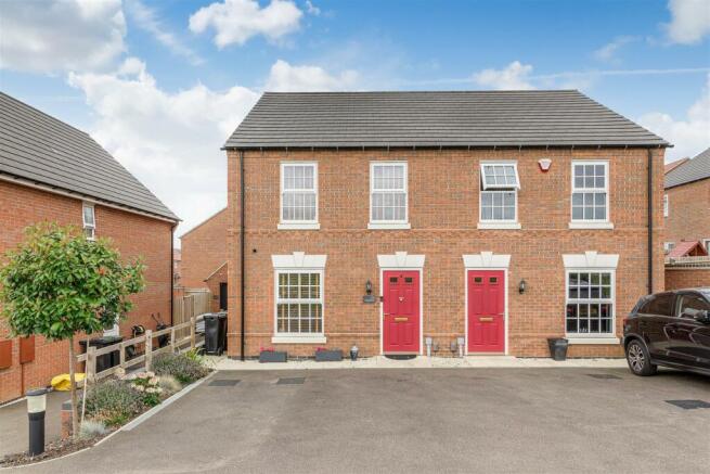 Front Elevation (left hand house)