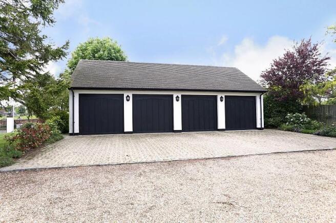 Extensive Garaging with Overhead Studio