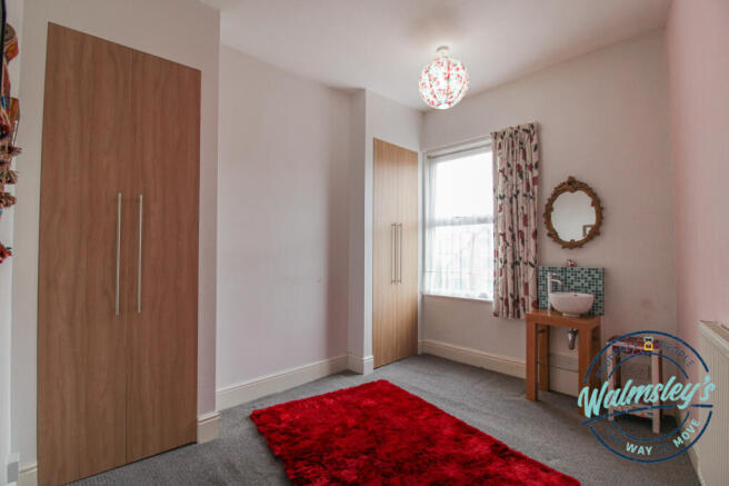 Rear double bedroom with basin & WC