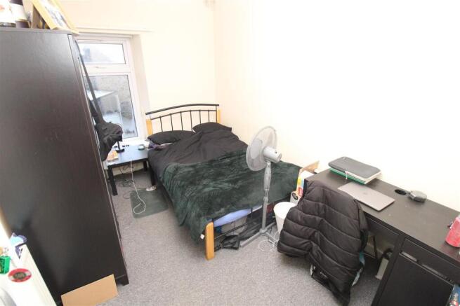 Bright double bedroom with ample desk space...