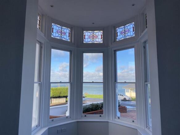 Elegant bay window with stunning coastal views...