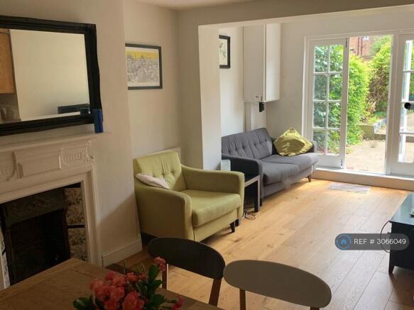 Dining And Lounge Areas On Garden