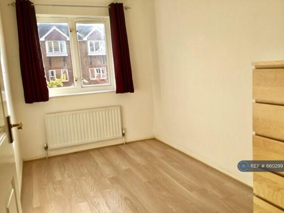 Neat And Bright Bedroom 2