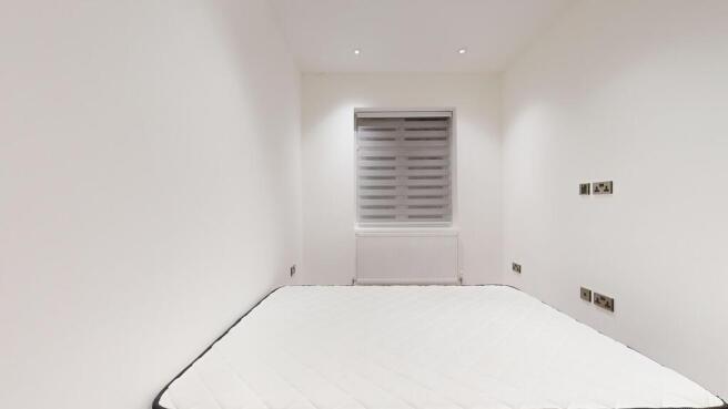 Minimal, bright bedroom with fresh white decor...