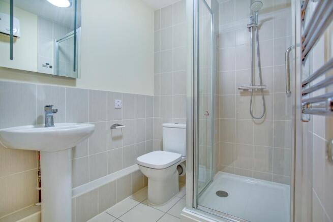a bathroom with a glass shower