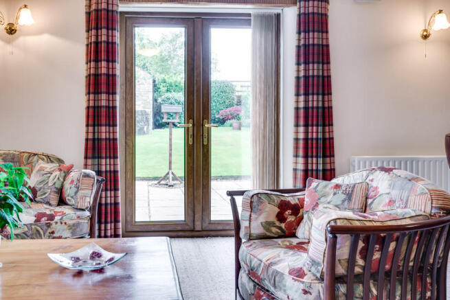 French Doors Lead...