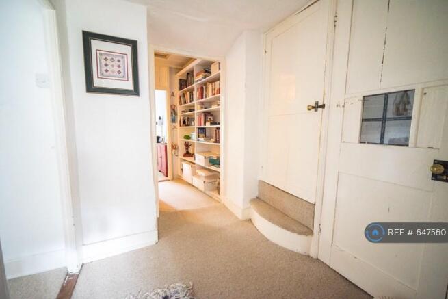 Upstairs Hallway With Built In Bookcase