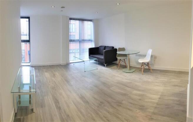 Spacious modern lounge with stylish wood floors...