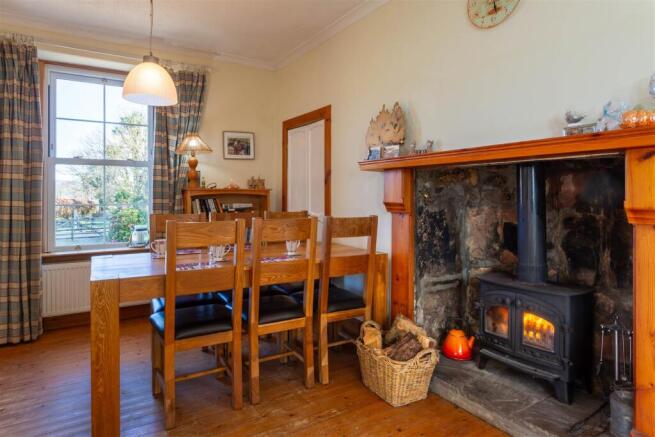 Dining area showing stove