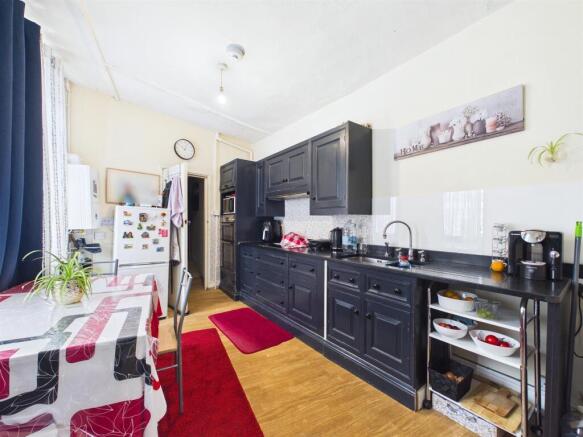 House arranged as two flats for auction, Totterdow