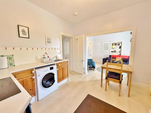 Kitchen area to lounge and hallway