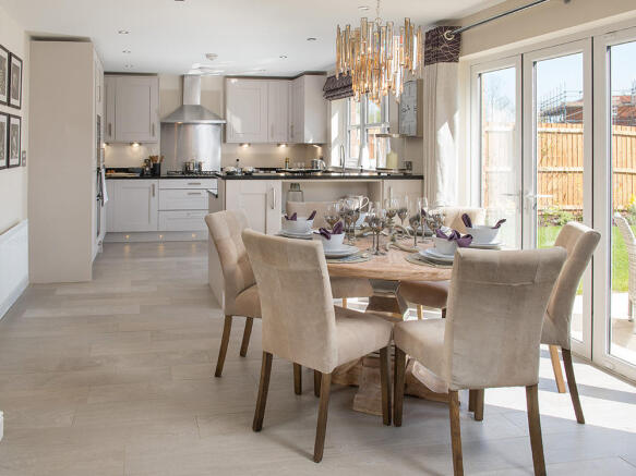 Kitchen and dining area with bi-fold doors to the outside