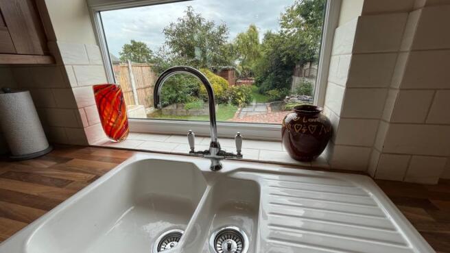 Sink, swan neck out to the garden