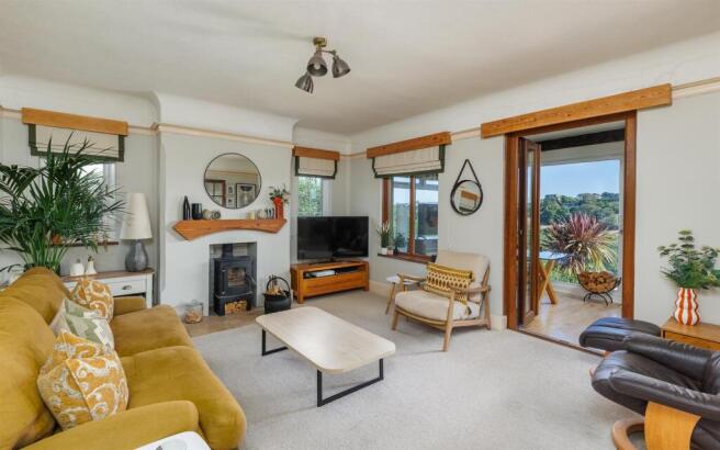 Stylish sitting room with log burner