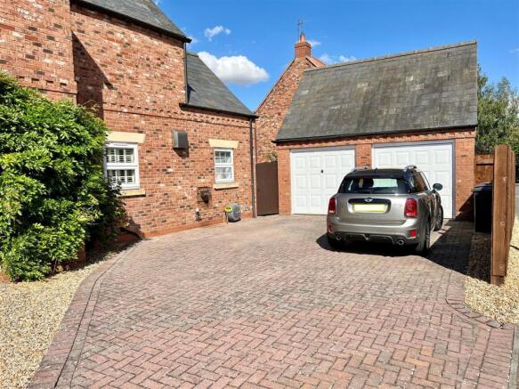 Double Garage & Block Paved Driveway