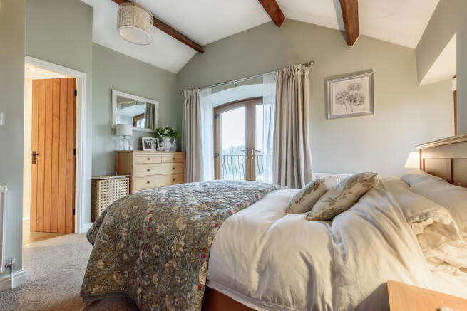Bedroom 1 with ba...