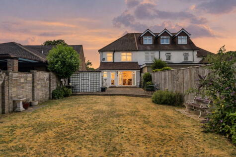 Chain free in central Wigmore, an extended family home with open-plan living, driveway, garage and a generous garden.