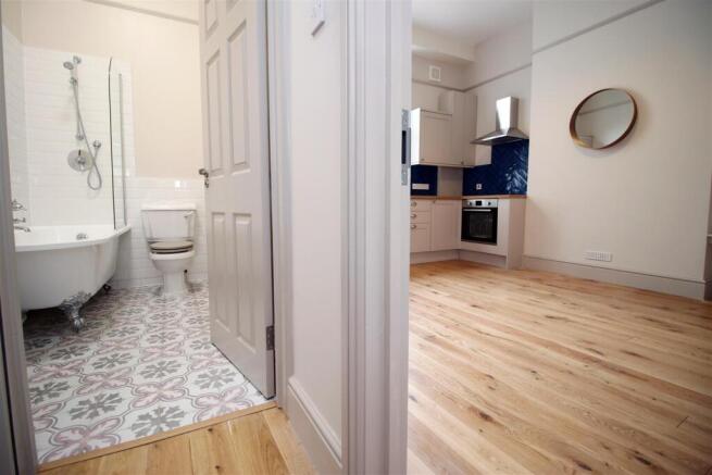 Stylish bathroom with freestanding bathtub...