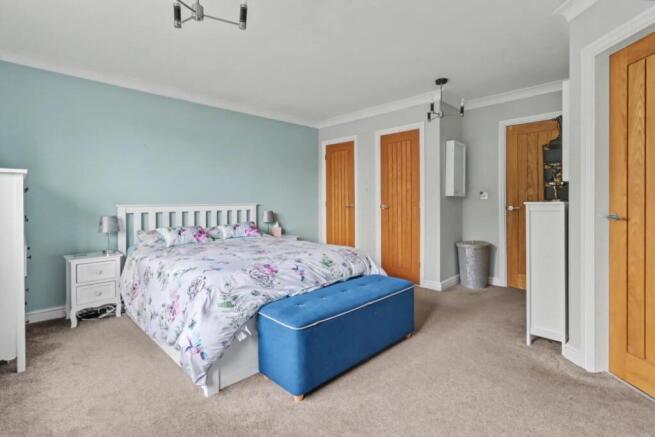 Main bedroom with built in wardrobes