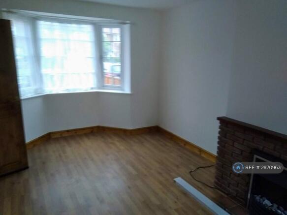 Living Room And Front Bay Window
