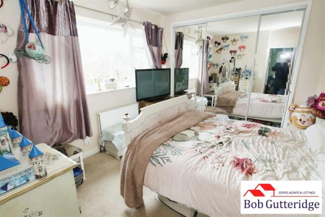 BEDROOM ONE (REAR)