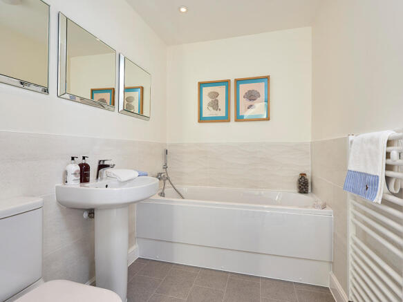 Extensively tiled bathroom