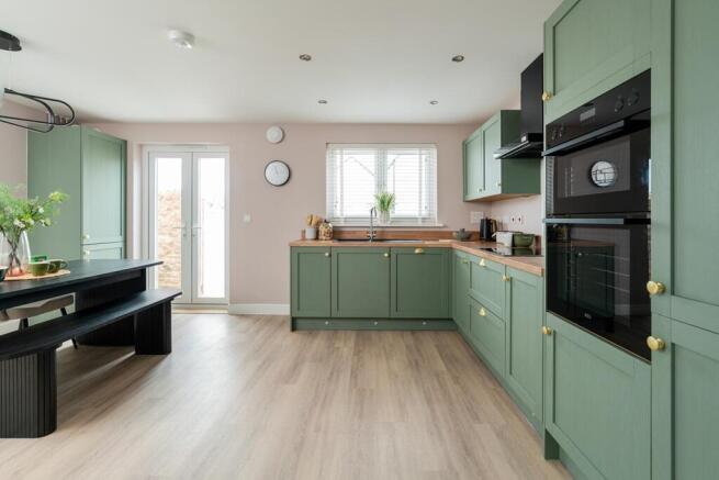 Spacious kitchen/diner with a French doors to the rear garden