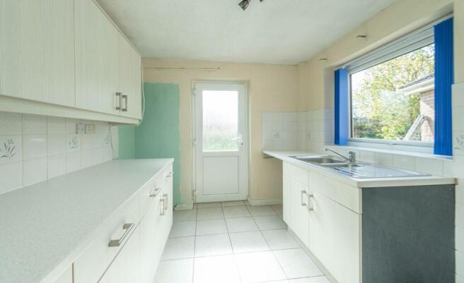 SITTING ROOM DINING ROOM AND KITCHEN