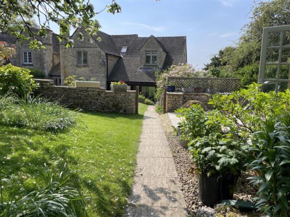 Garden to rear of house and path.JPG