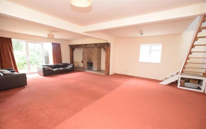Living room with staircase.jpg