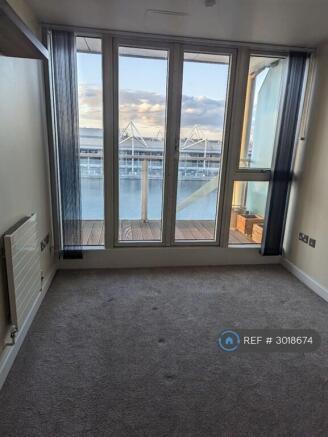 Large Master Bedroom With Balcony