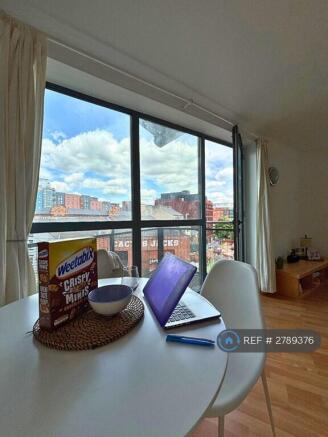 Dining Area With Balcony